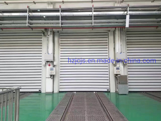 باب المرآب الآلي الحلزوني الآلي W8000mm*H8000mm 0.8-1.5mm -35 إلى 65 درجة مئوية